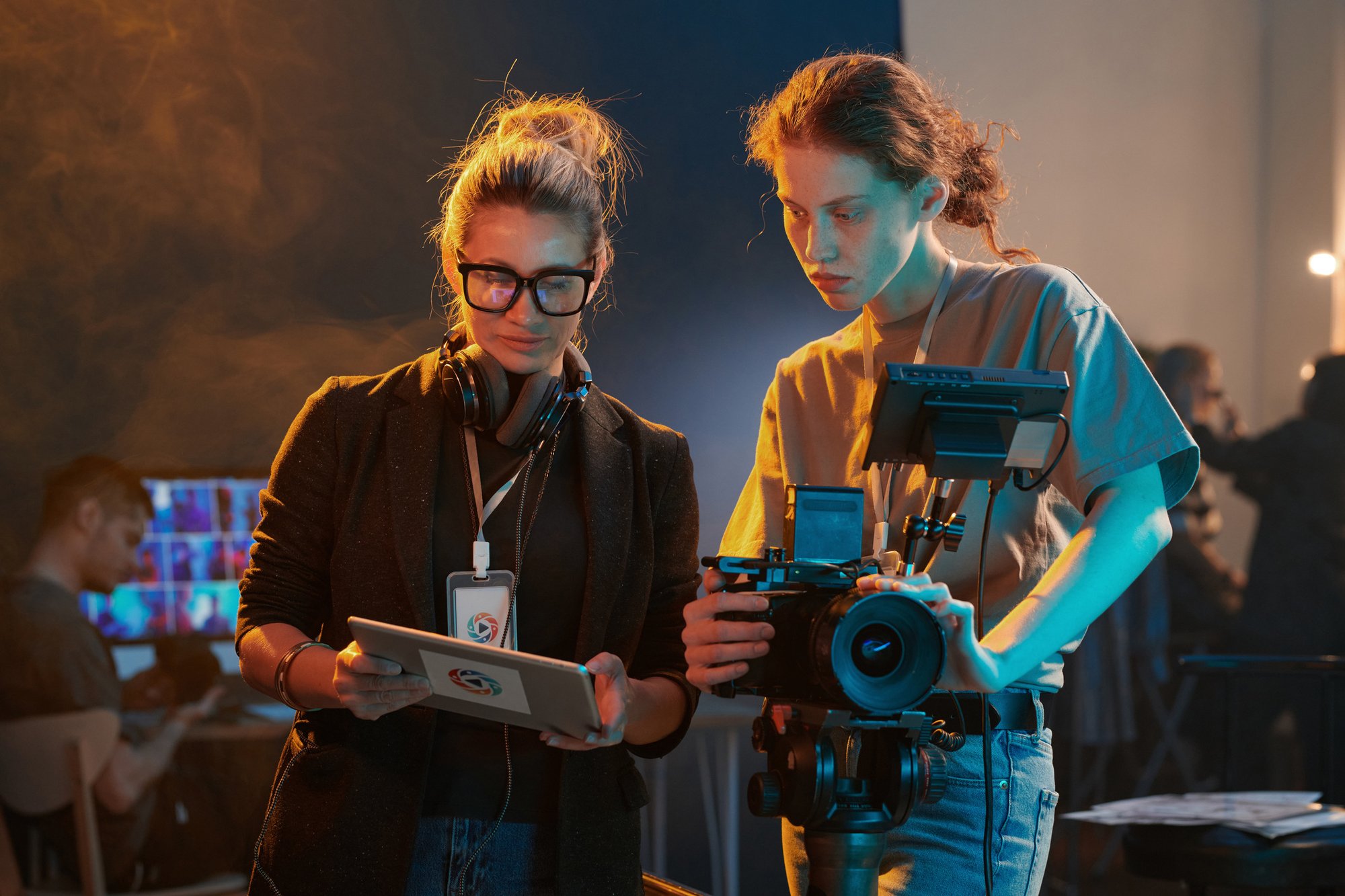 Two-Women-Working-in-Video-Production-And-Using-Tablet-2151886097_2125x1416