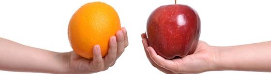 holding orange and apple