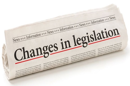 newspaper with headline changes in legislation