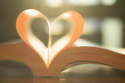 book pages forming heart
