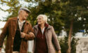 older couple linked arms walking