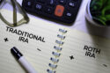 traditional and roth ira in notebook